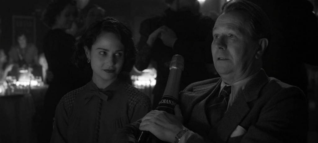 Gary Oldman and Tuppence Middleton in Mank (2020)-movie review by Glenn Frankel
