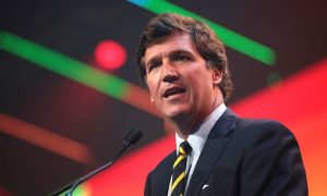 Headshot of Tucker Carlson.