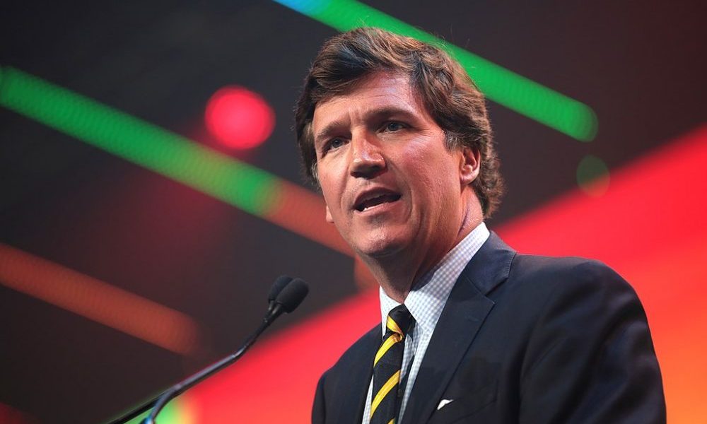 Headshot of Tucker Carlson.