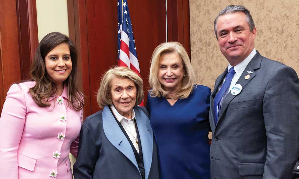 From left, Representative Elise Stefanik (R-NY), late Holocaust survivor Esther Peterseil and Representatives Carolyn B. Maloney (D-NY) and Don Bacon (R-NE) pose for a photograph before the U.S. House of Representatives vote on the Never Again Education Act in January 2020.