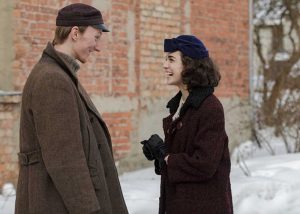 Davis Suharevskis and Brigita Cmuntová in The Sign Painter (2020)