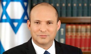 A headshot of Prime Minister Naftali Bennet