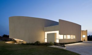 a white spiral shaped synagogue