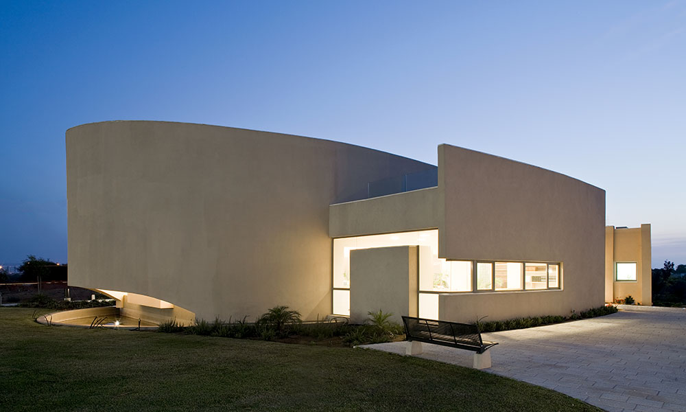 a white spiral shaped synagogue