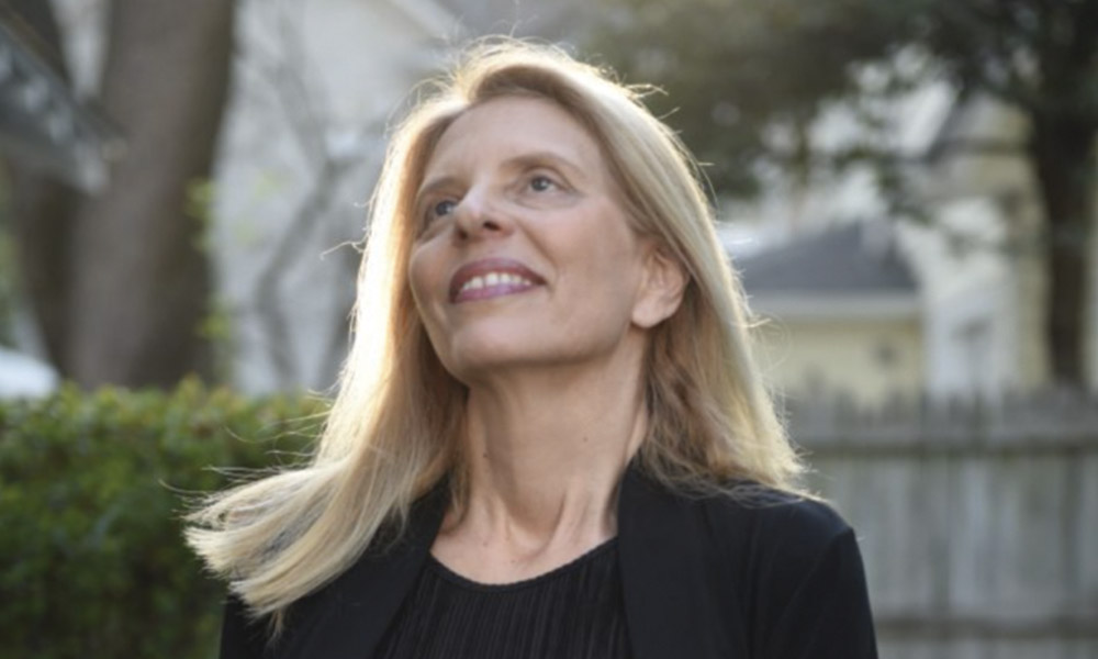 A photograph of Nadine Epstein, Editor in Chief