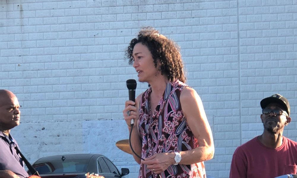 Rabbi Nancy Kastan speaks in front of a group advocating for reproductive rights.