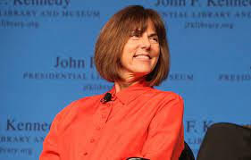 Janis Hircsh smiling while on stage at an event