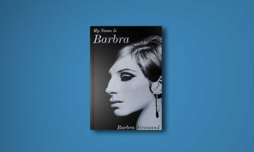 Barbra Streisand looking to her right, in a black and white photo. Only the left side of her face is visible