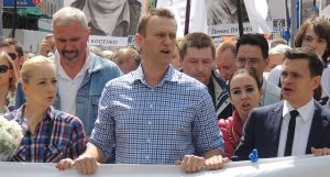 Navalny at a 2013 rally with his wife, Yulia