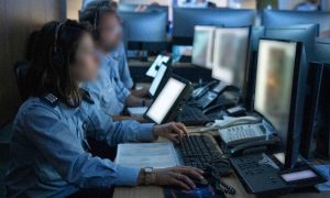 IDF military personnel working on computers..