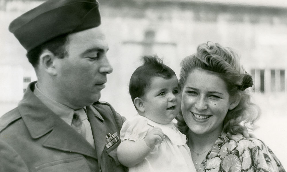 Aviva Kempner as baby, held by her parents