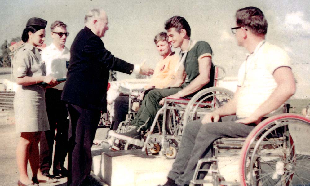 Ludwig Guttmann presenting the gold medal to Tony South at 1968 Paralympics in Tel Aviv