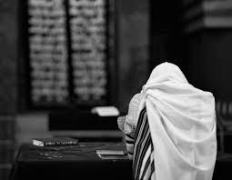 Yom Kippur prayer Black and white image of Jew in prayer with tallit on.