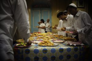 Yom Kippur break fast Jews breaking the fast on Yom Kippur.