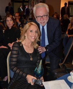Dana Bash (with her award) and Honorary Gala Co-chair Wolf Blitzer at Moment's 2024 benefit and awards dinner.