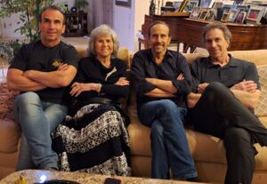 Eileen Greene with her three sons (left to right), Larry (62), Richard (70), Ed (65), February, 2024.