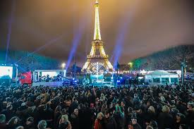 public menorah Public menorah lighting ceremony in front of the eiffel tower.