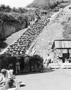 Prisoners forced to carry granite blocks up 186 "Stairs of Death" to the top of the quarry.