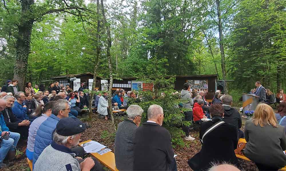 People gathered in the woods outside Gunskirchen, Austria, to commemorate the liberation of the concentration camp there.