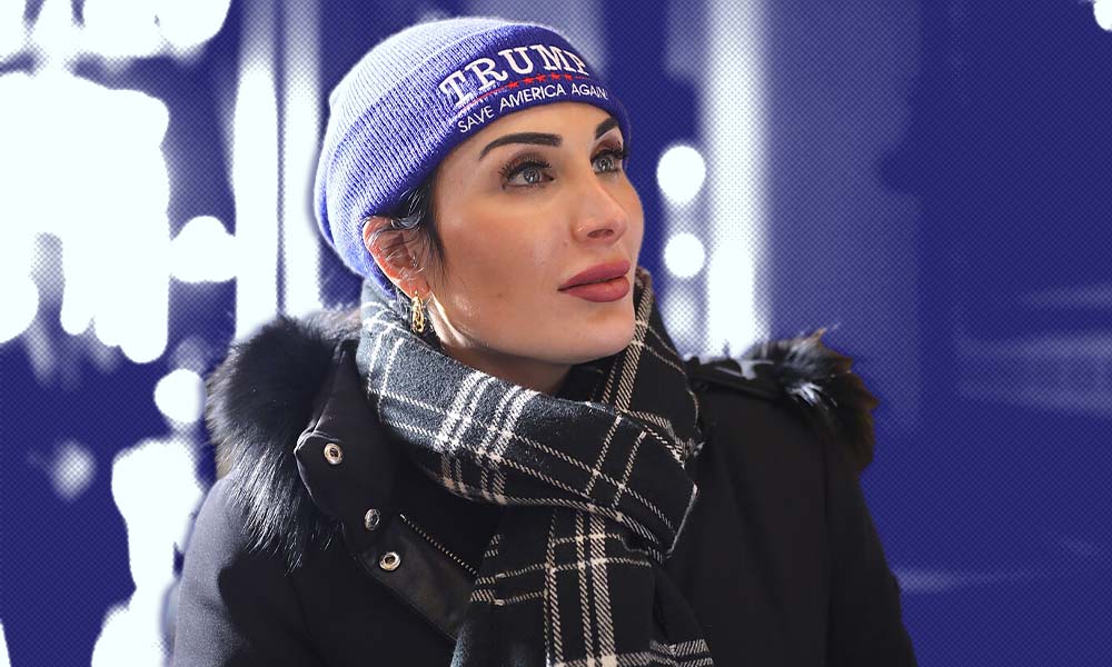 Laura Loomer wears a Trump beanie