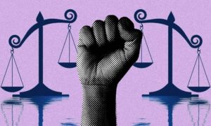 raised fist between unbalanced scales of justice